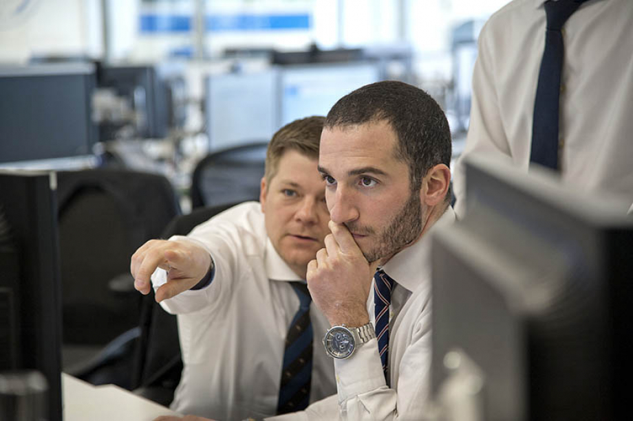 ESM staff at work in the trading room